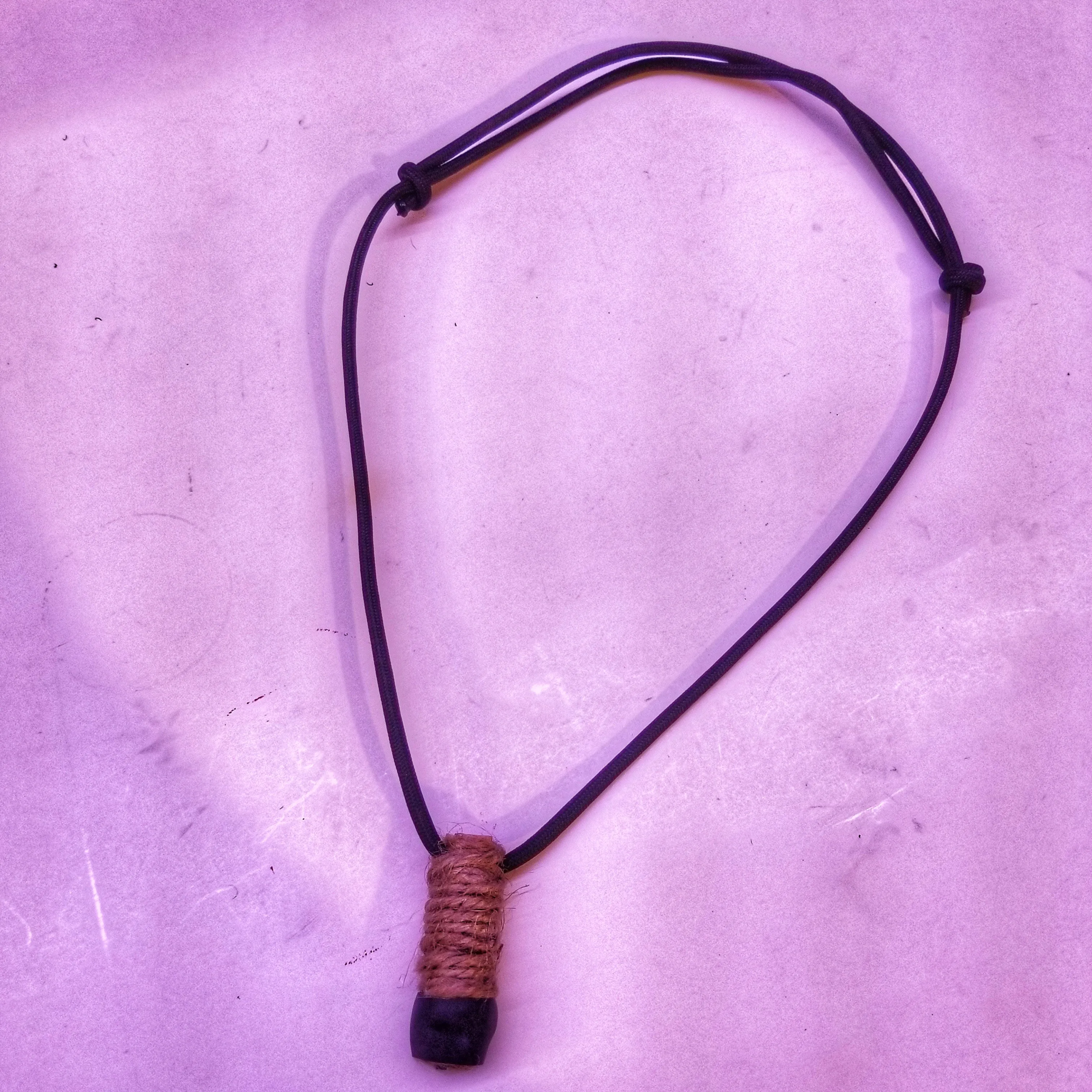 Survival Craft Collar: ParaCord Necklace, wire, fishline, tinder, firestarter, waxed wood.