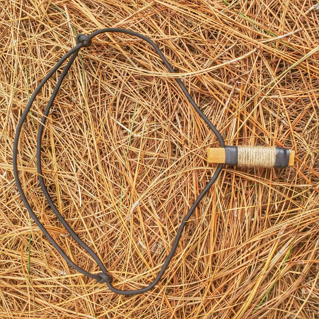 Survival Craft Collar: ParaCord Necklace, wire, fishline, tinder, firestarter, waxed wood.