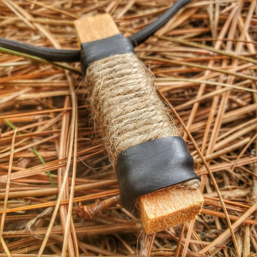 Survival Craft Collar: ParaCord Necklace, wire, fishline, tinder, firestarter, waxed wood.